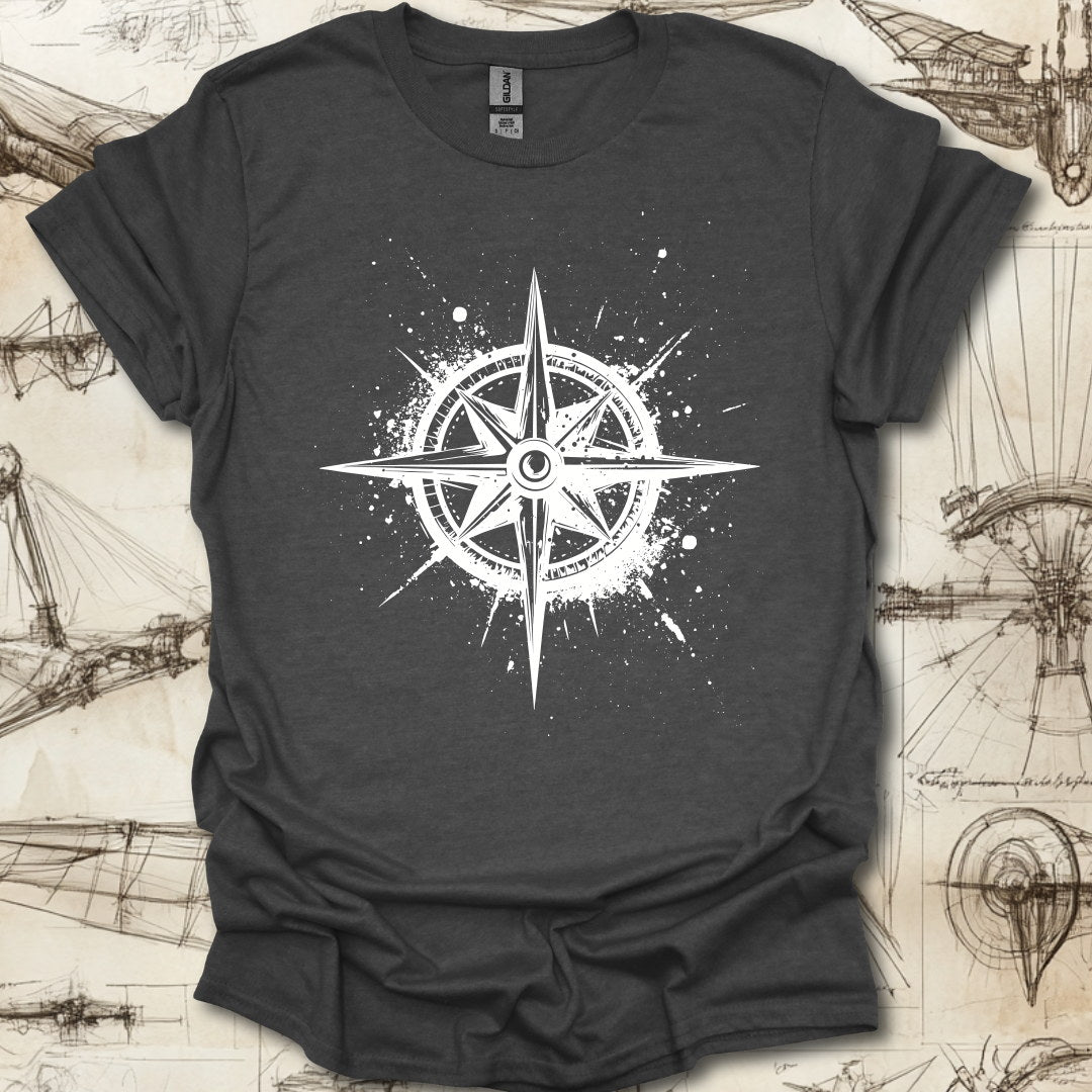 Grungy black compass rose with ink splatter design on steampunk-themed T-shirt