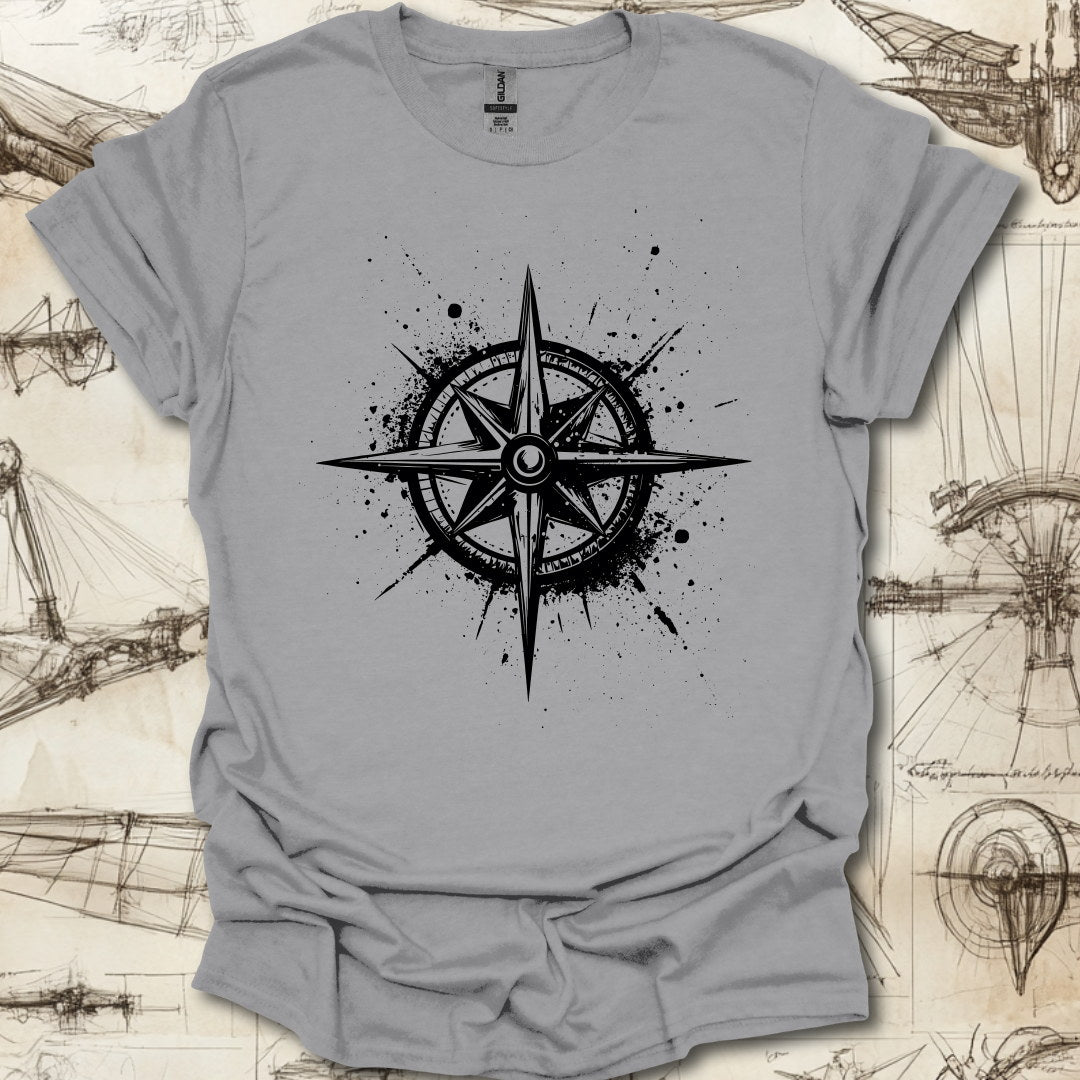 Grungy black compass rose with ink splatter design on steampunk-themed T-shirt