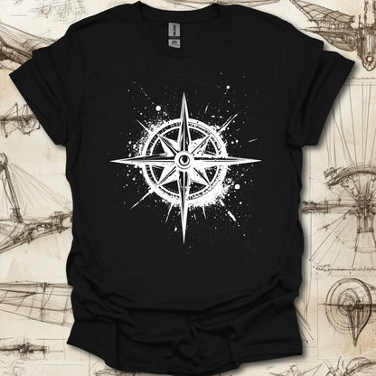 Grungy black compass rose with ink splatter design on steampunk-themed T-shirt